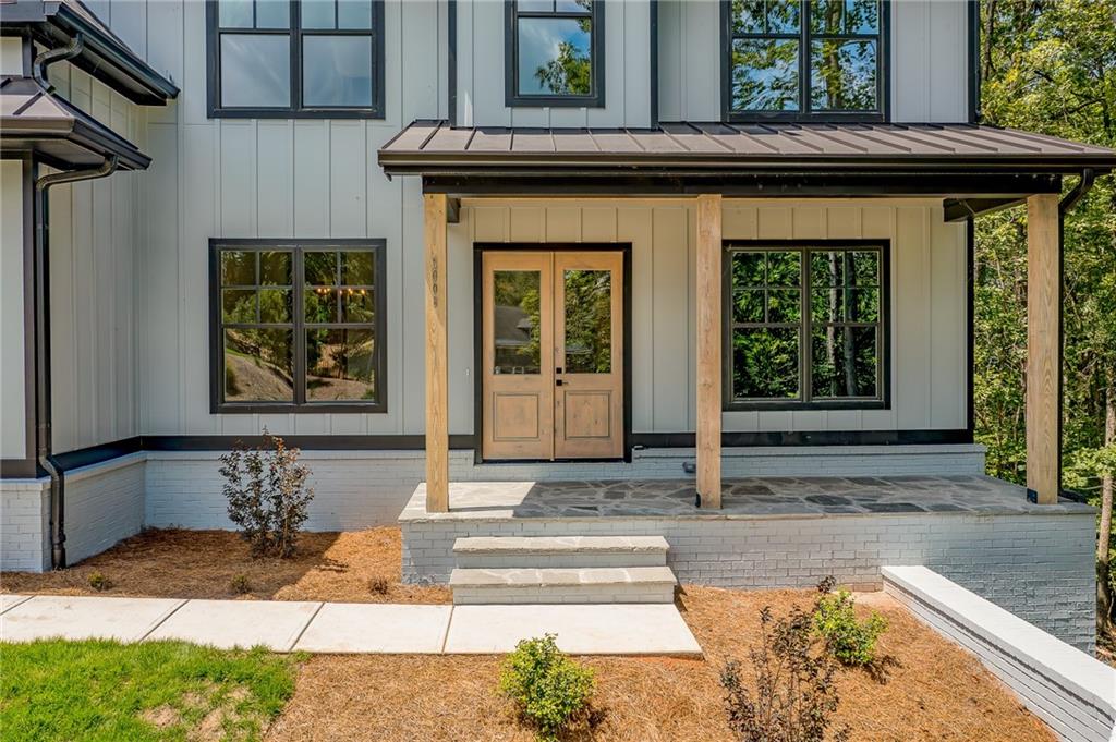6008 Tradewinds Cove Gainesville, GA 30506 - Photo 6 of 73 a view of entrance front of the house