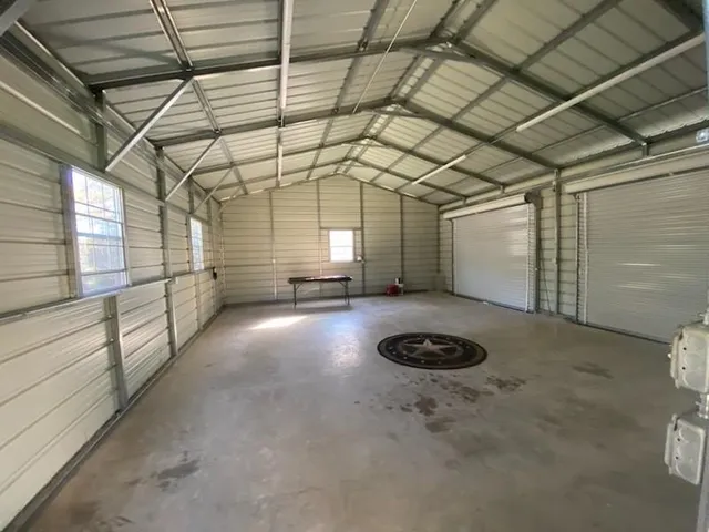 a view of a room with racks on the wall