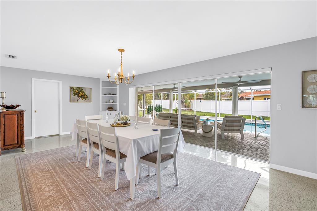 14546 Anchorage Circle Seminole, FL 33776 - Photo 27 of 88 a view of a dining room with furniture window and wooden floor