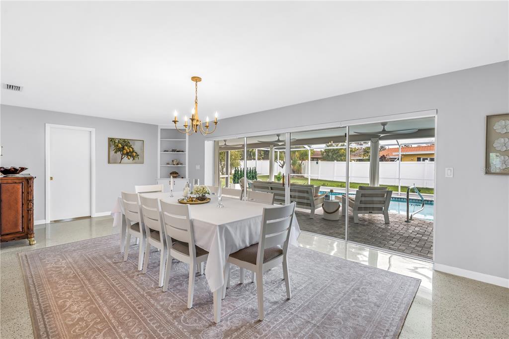 14546 Anchorage Circle Seminole, FL 33776 - Photo 28 of 88 a view of a dining room with furniture window and wooden floor