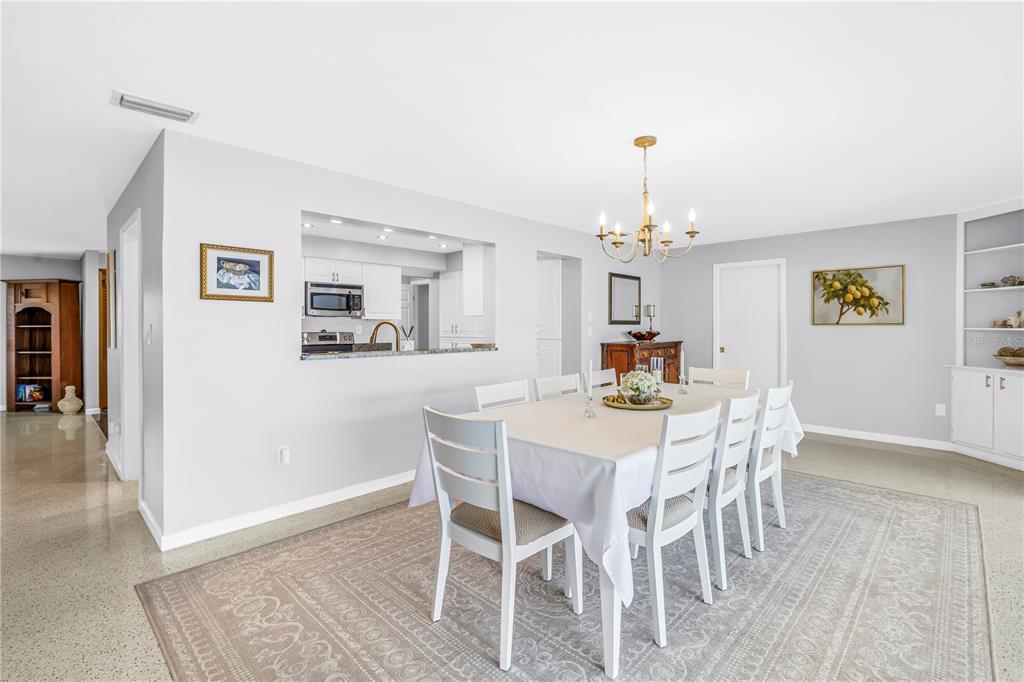 14546 Anchorage Circle Seminole, FL 33776 - Photo 29 of 88 a dining room with furniture and window