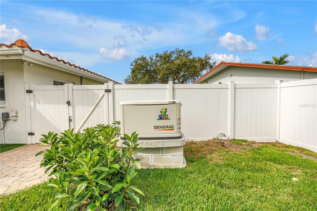 14546 Anchorage Circle Seminole, FL 33776 - Photo 61 of 88 front view of a house with a yard