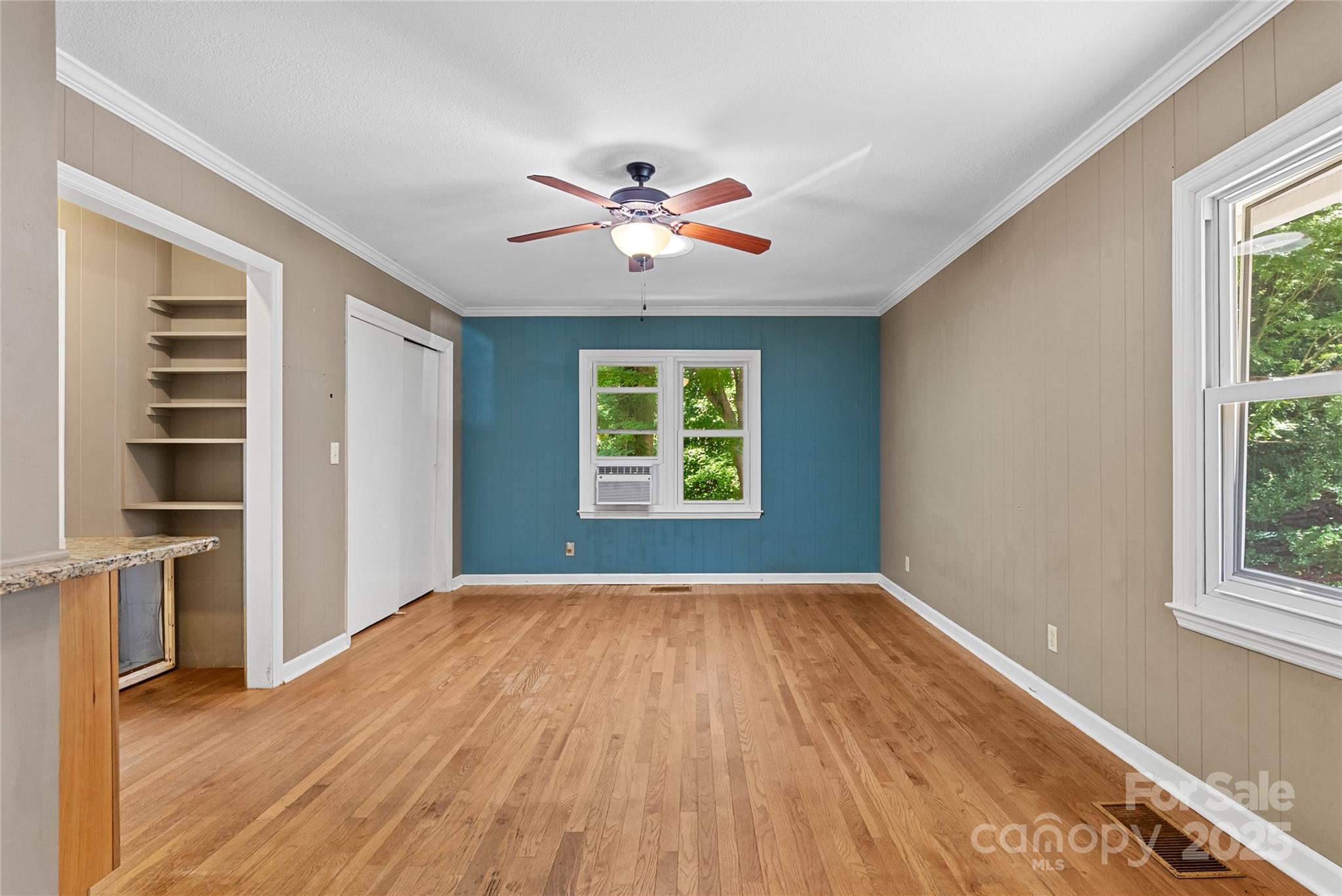80 Laurel Avenue Tryon, NC 28782 - Photo 16 of 43 wooden floor in an empty room with a window