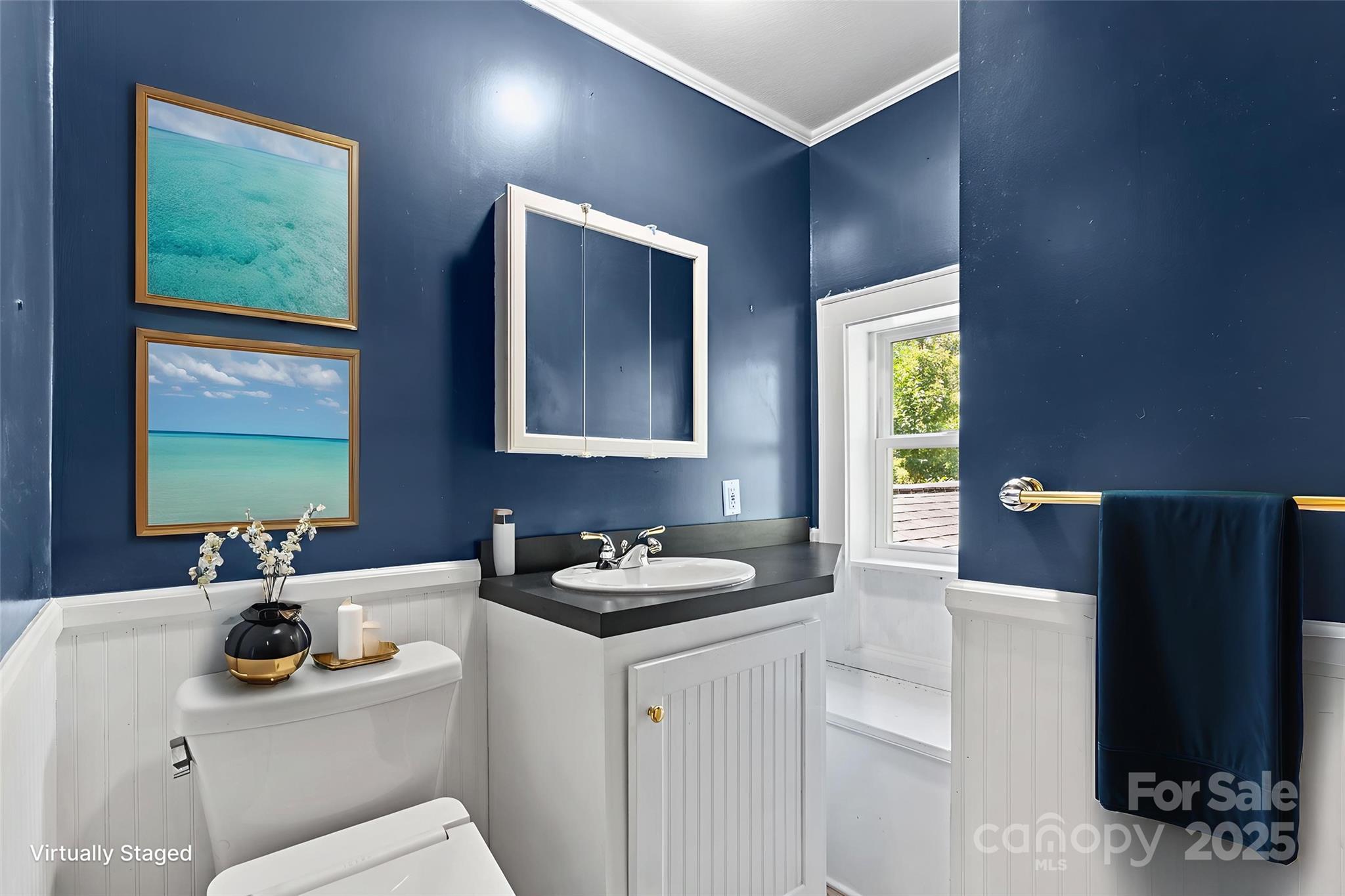 80 Laurel Avenue Tryon, NC 28782 - Photo 26 of 43 a bathroom with a sink and a mirror