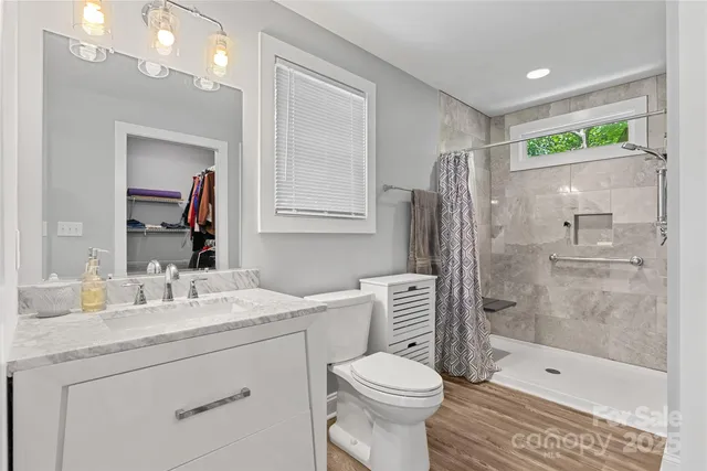 a view of a balcony with wooden floor