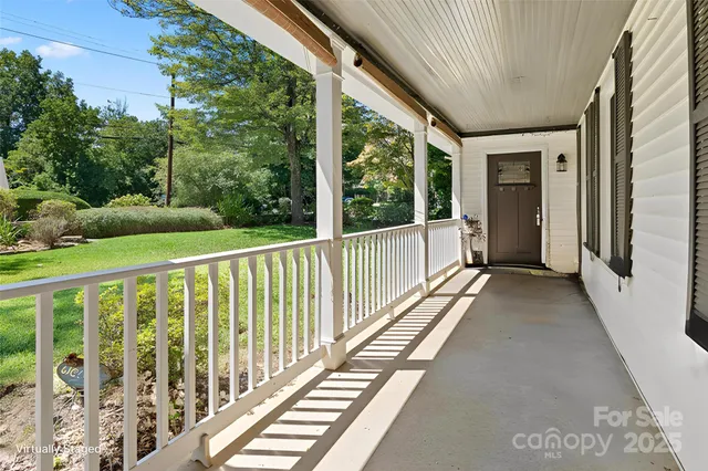 a view of street from balcony