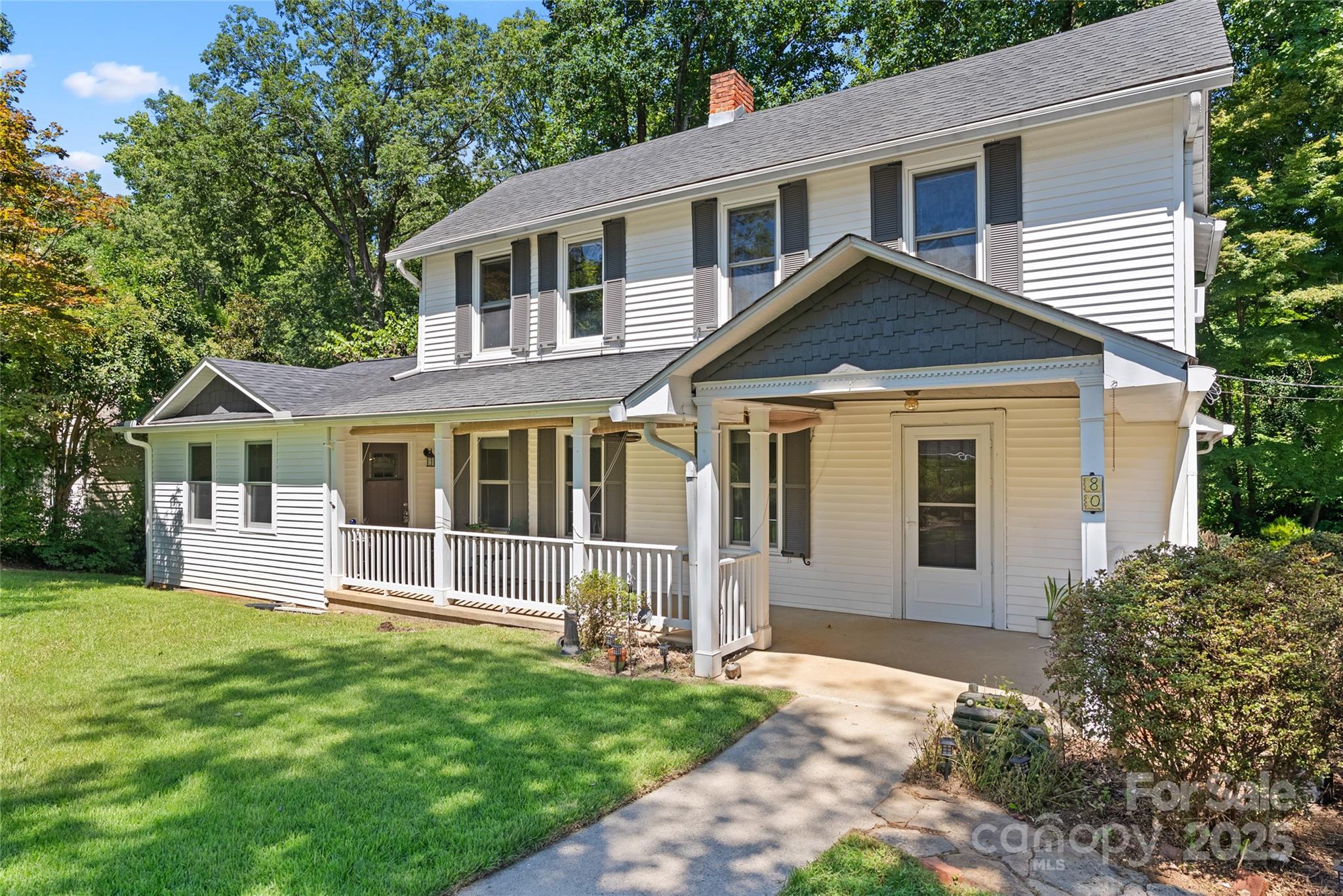 80 Laurel Avenue Tryon, NC 28782 - Photo 43 of 43 a front view of a house with a yard