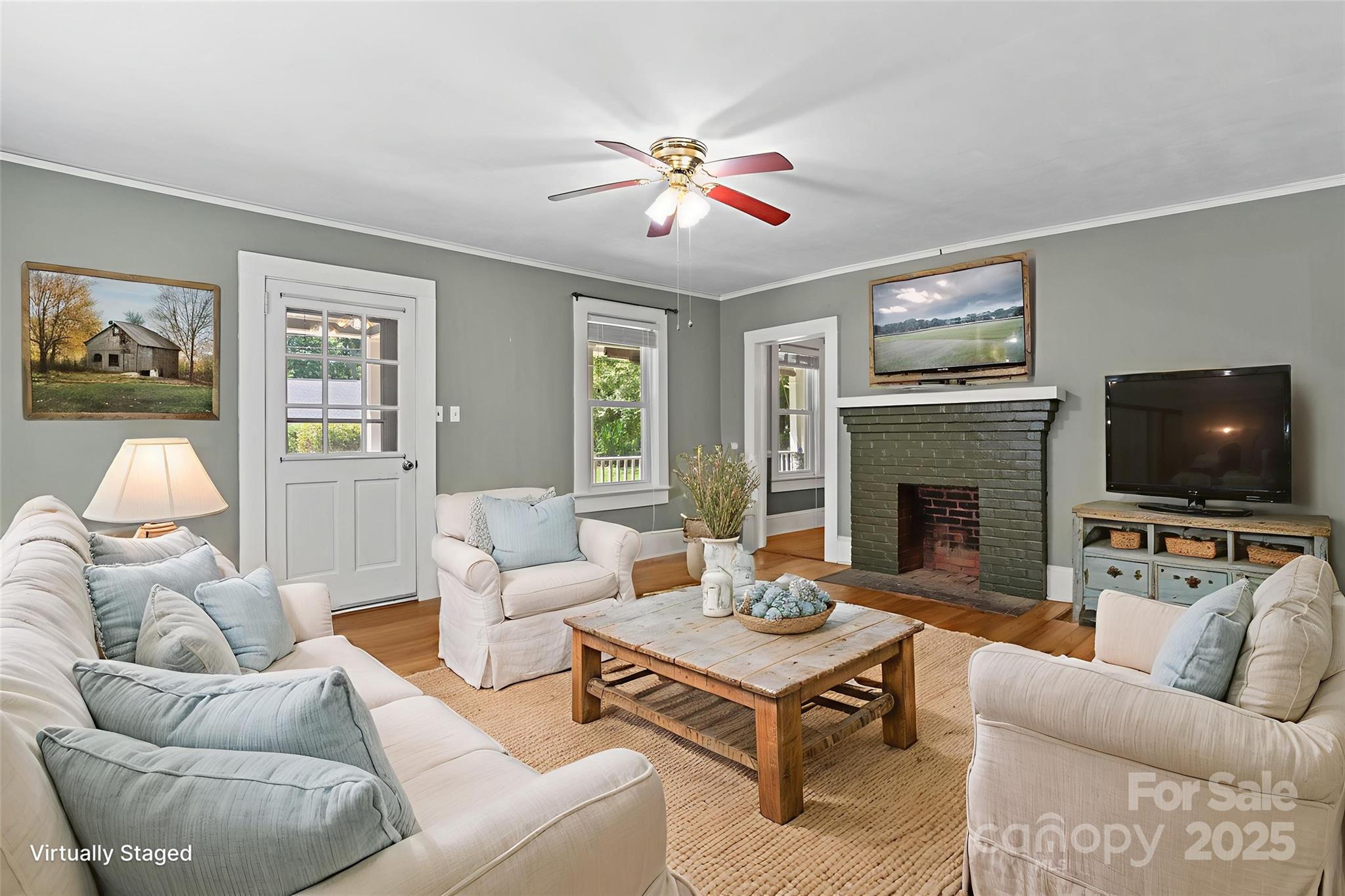 80 Laurel Avenue Tryon, NC 28782 - Photo 7 of 43 a living room with furniture and a flat screen tv