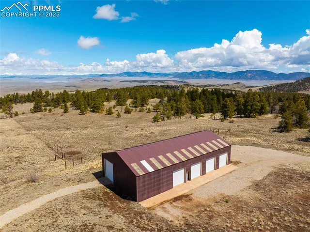 a view of a parking space in front of a building