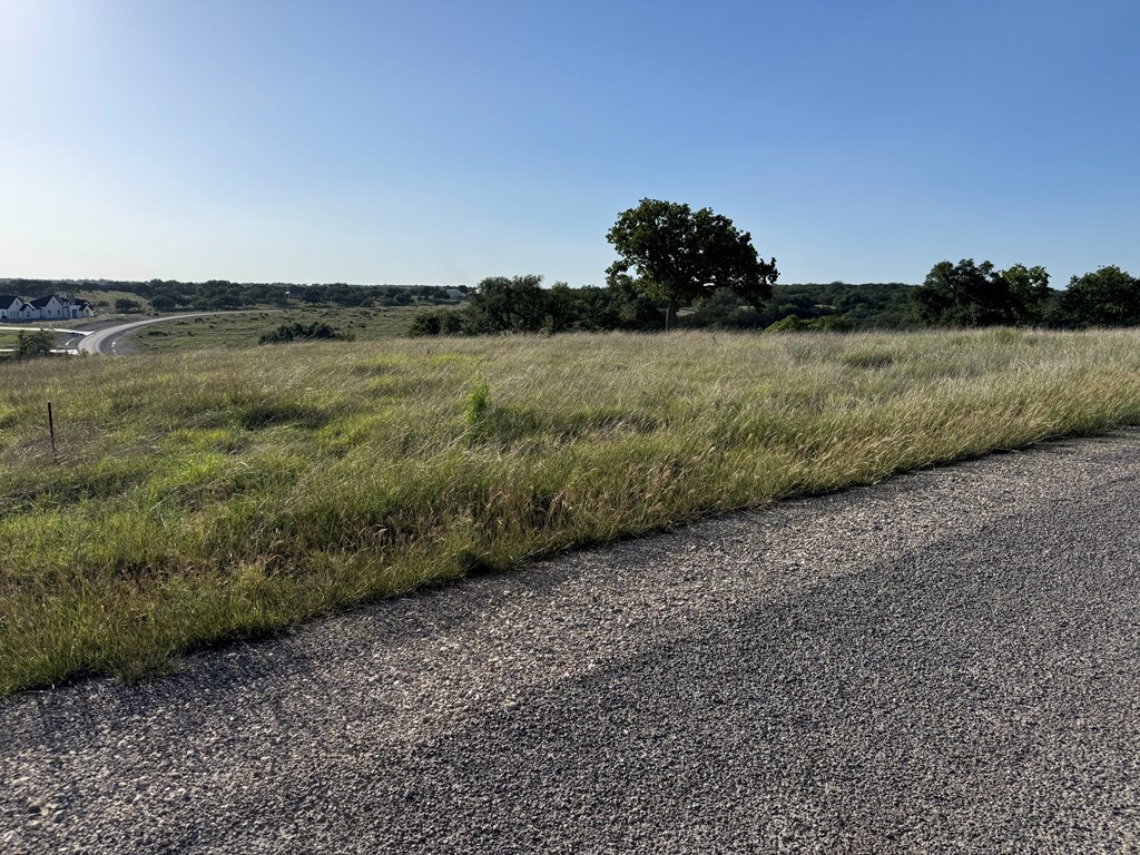 114 Patterson Rdg Drive, Unit 114 Kerrville, TX 78028 - Photo 4 of 9 a view of a lake with a city