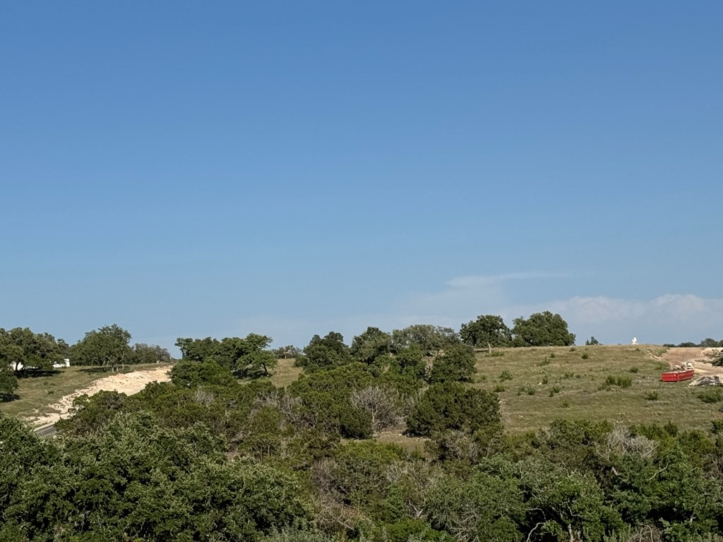 114 Patterson Rdg Drive, Unit 114 Kerrville, TX 78028 - Photo 8 of 9 a view of a houses with a yard