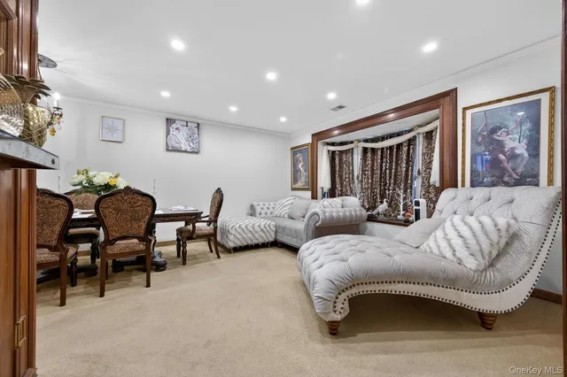 a spacious bedroom with a bed and a couch