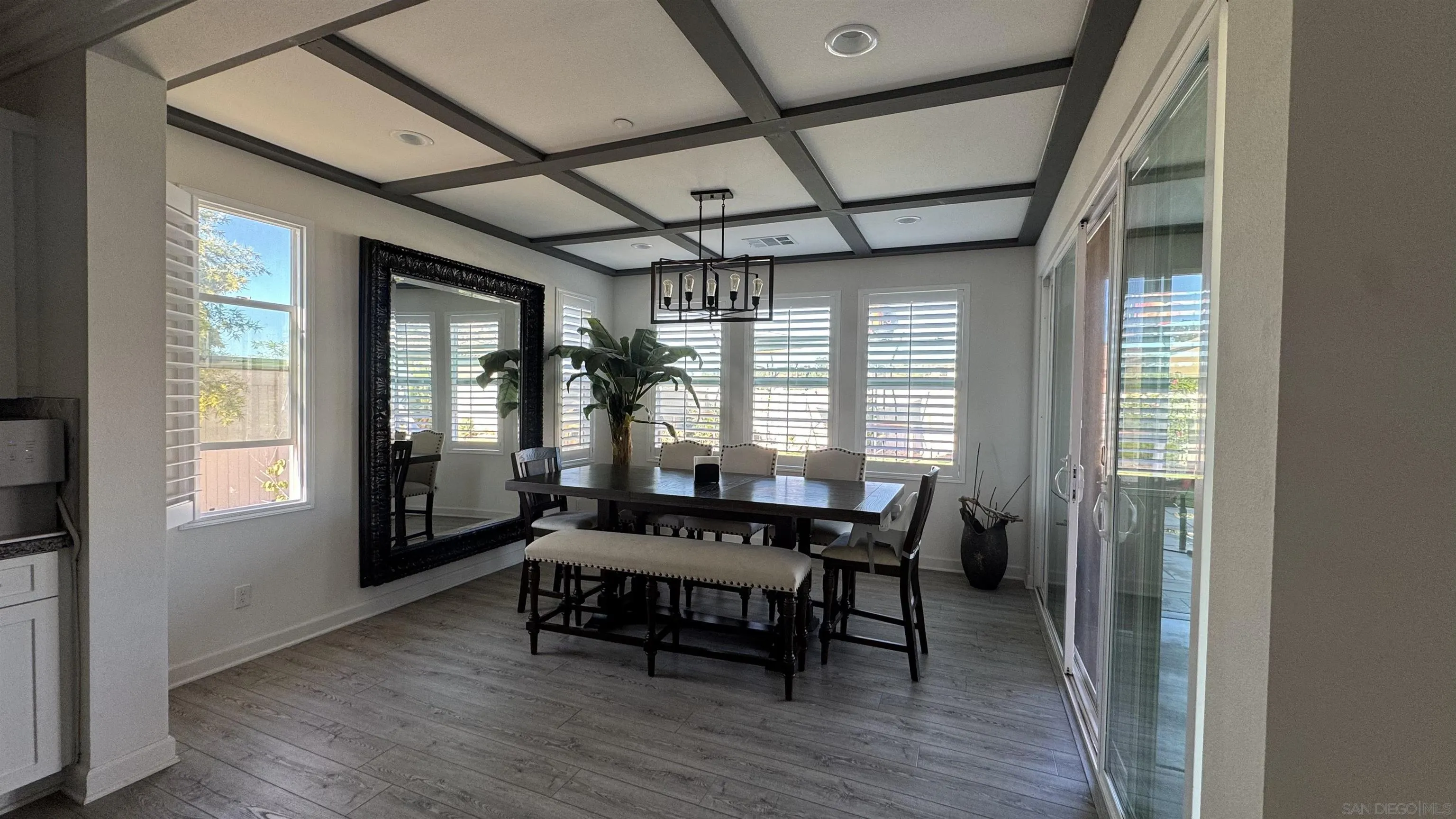 1337 Baumgartner Way Escondido, CA 92026 - Photo 13 of 20 a dining room with furniture and wooden floor