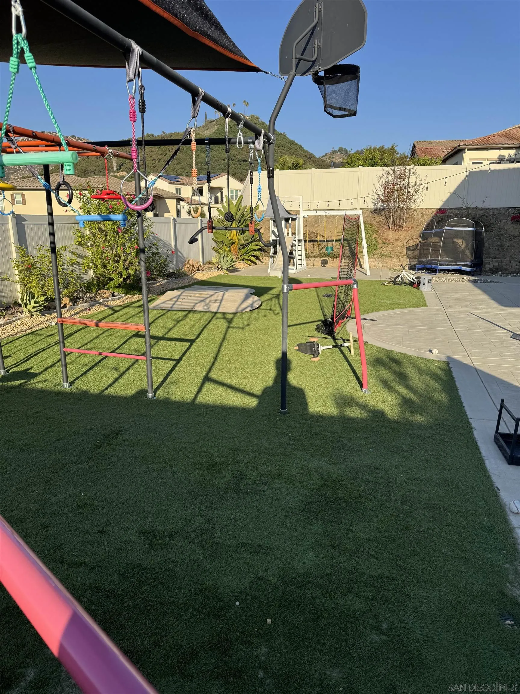 1337 Baumgartner Way Escondido, CA 92026 - Photo 7 of 20 a view of a backyard with a patio