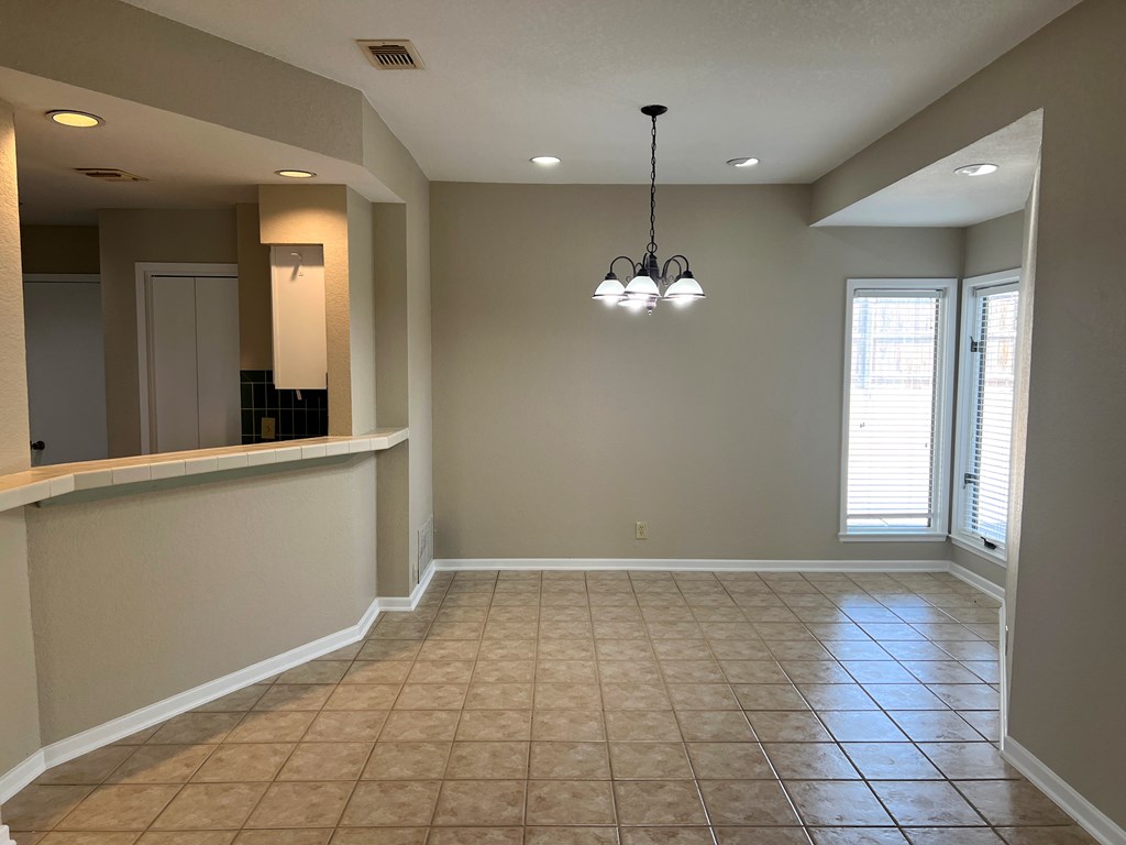 805-139 Highway 534 Loop Kerrville, TX 78028 - Photo 13 of 28 wooden floor in an empty room with a window