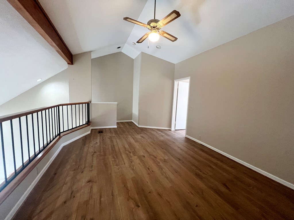 805-139 Highway 534 Loop Kerrville, TX 78028 - Photo 15 of 28 wooden floor in an empty room with a window