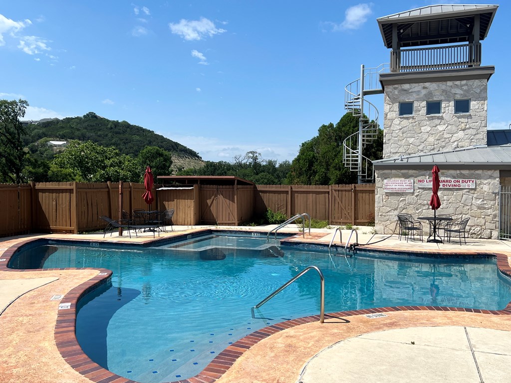 805-139 Highway 534 Loop Kerrville, TX 78028 - Photo 23 of 28 a view of a backyard with swimming pool