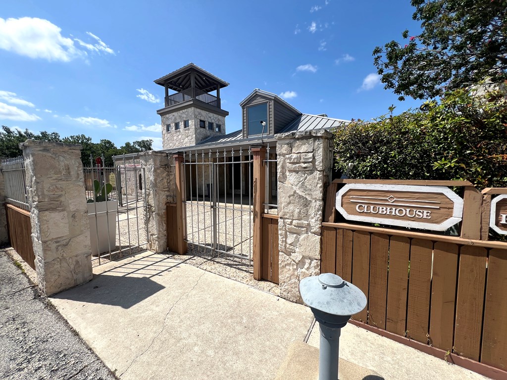 805-139 Highway 534 Loop Kerrville, TX 78028 - Photo 26 of 28 a front view of a building with parking space