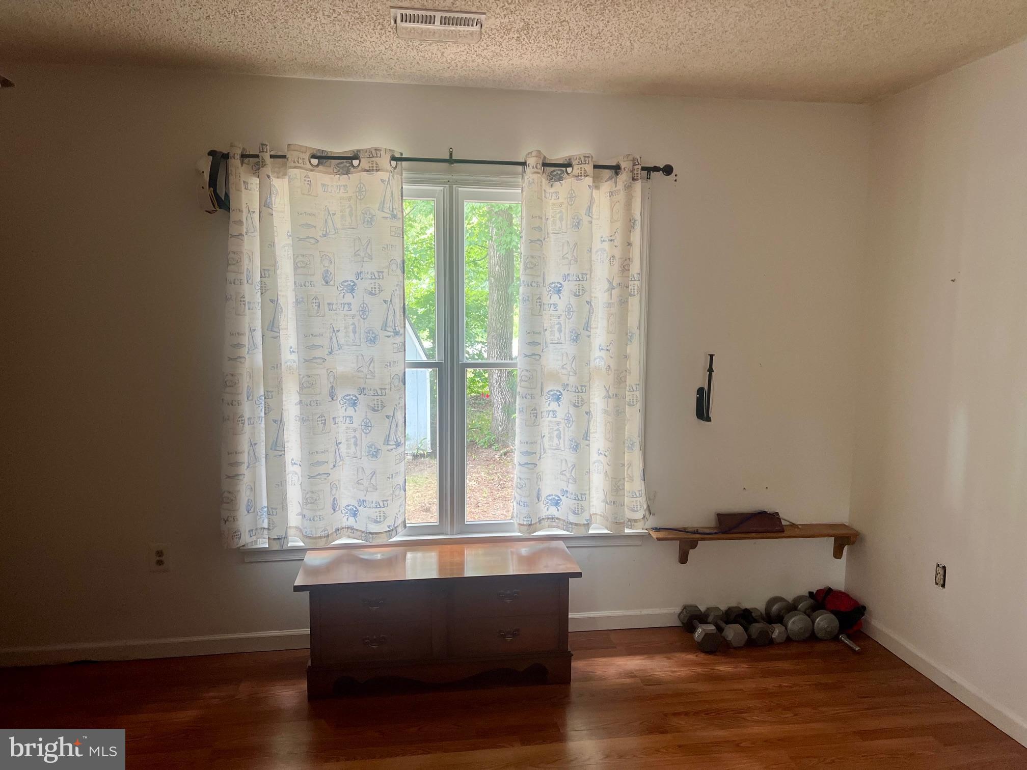 60 Nottingham Lane Berlin, MD 21811 - Photo 13 of 38 a spacious bathroom with a bathtub and window