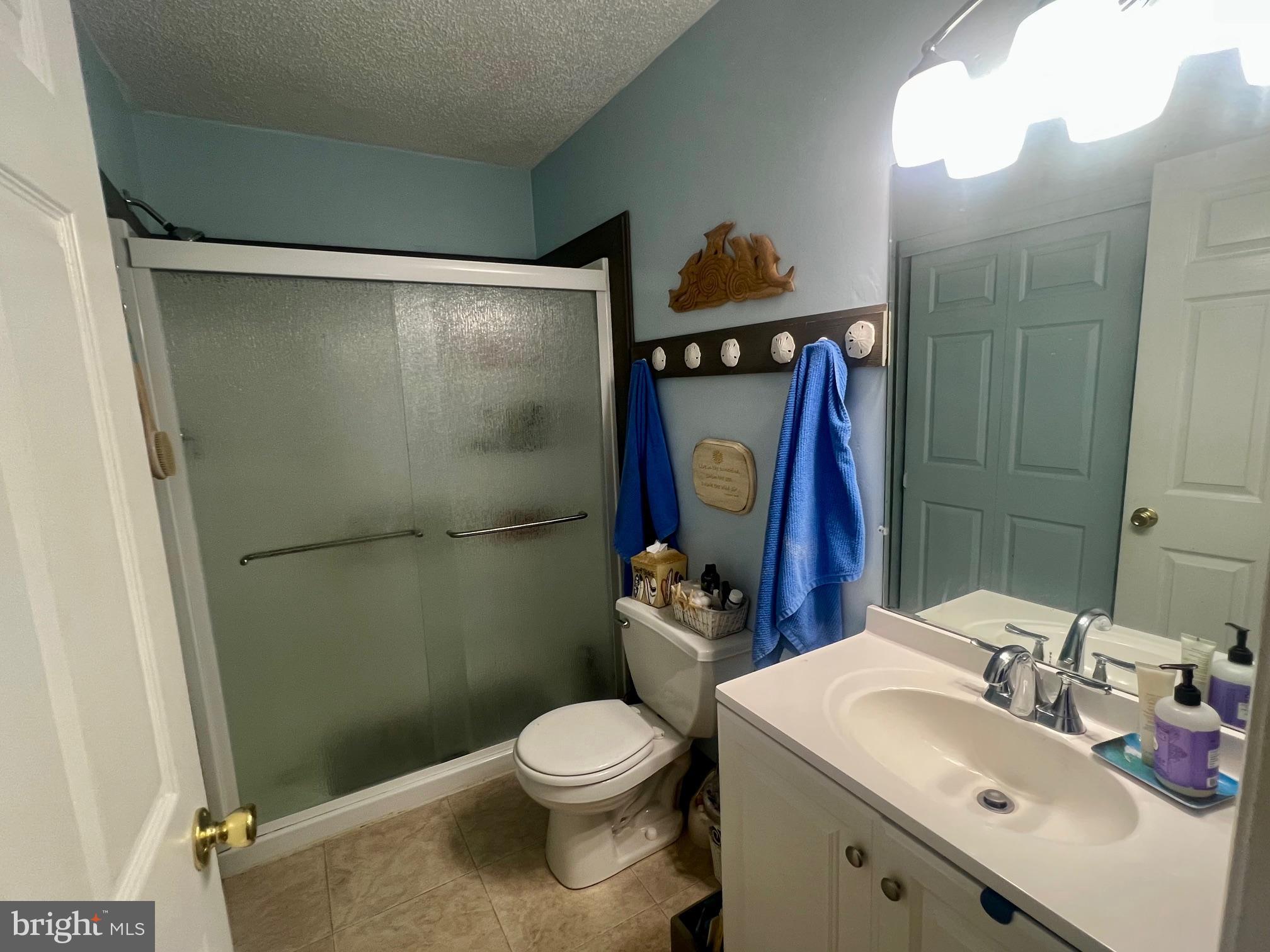 60 Nottingham Lane Berlin, MD 21811 - Photo 17 of 38 a bathroom with a sink toilet and shower