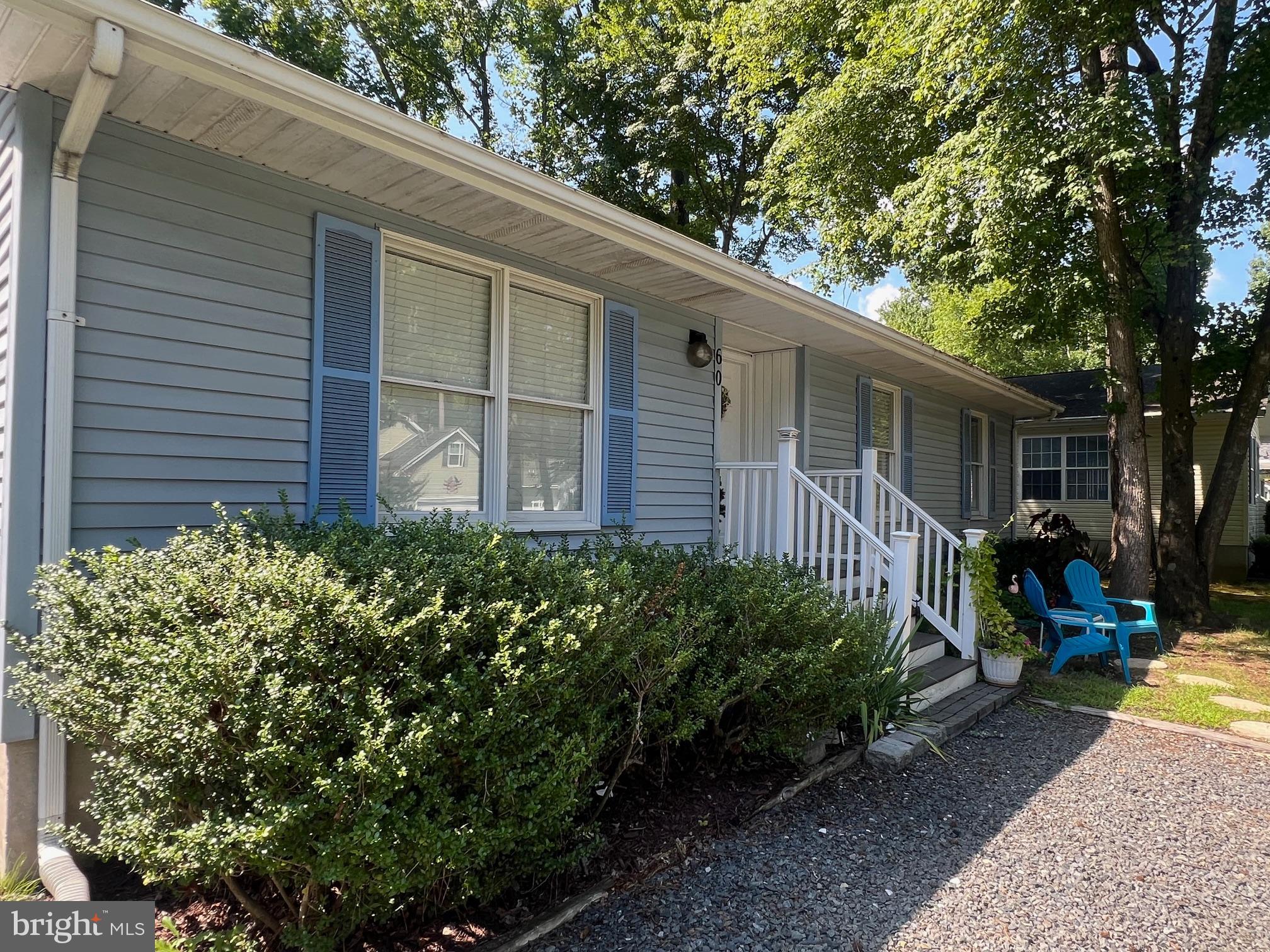 60 Nottingham Lane Berlin, MD 21811 - Photo 22 of 38 a view of a house with a yard and plants