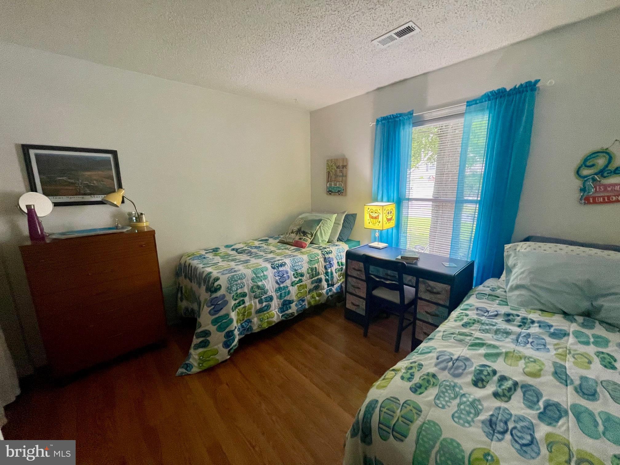 60 Nottingham Lane Berlin, MD 21811 - Photo 10 of 38 a bedroom with bed and window