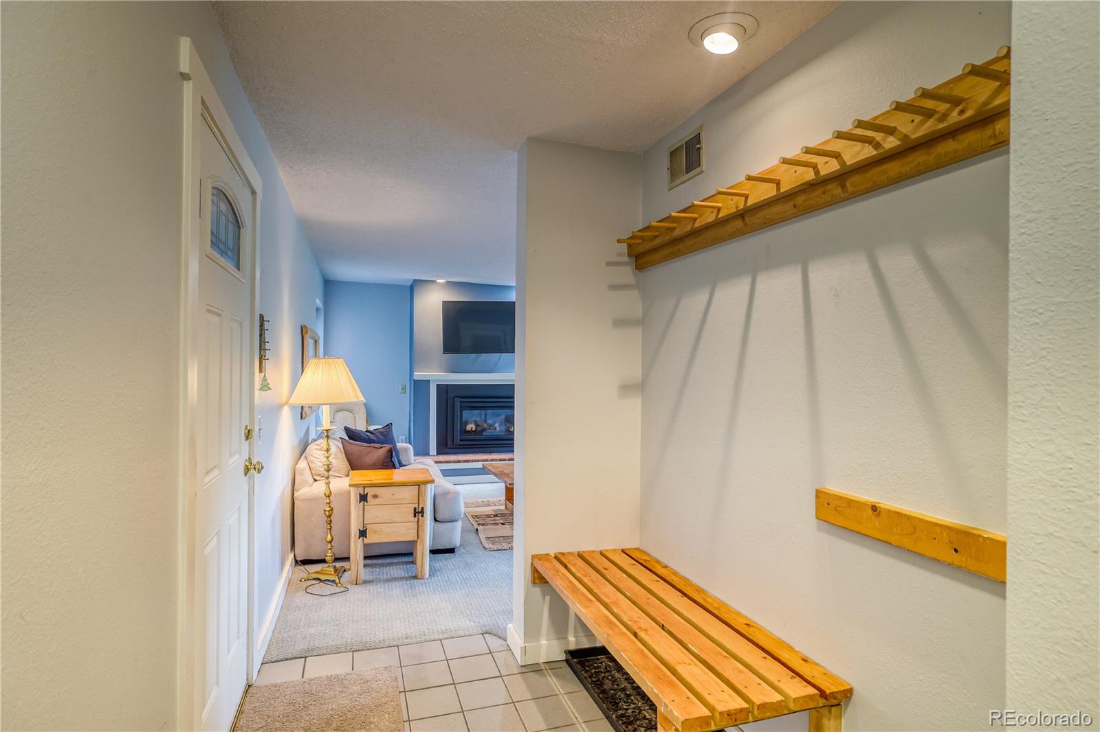 2510 Ryan Gulch Road, Unit 2512 Silverthorne, CO 80498 - Photo 18 of 41 a view of living room with furniture and a rug