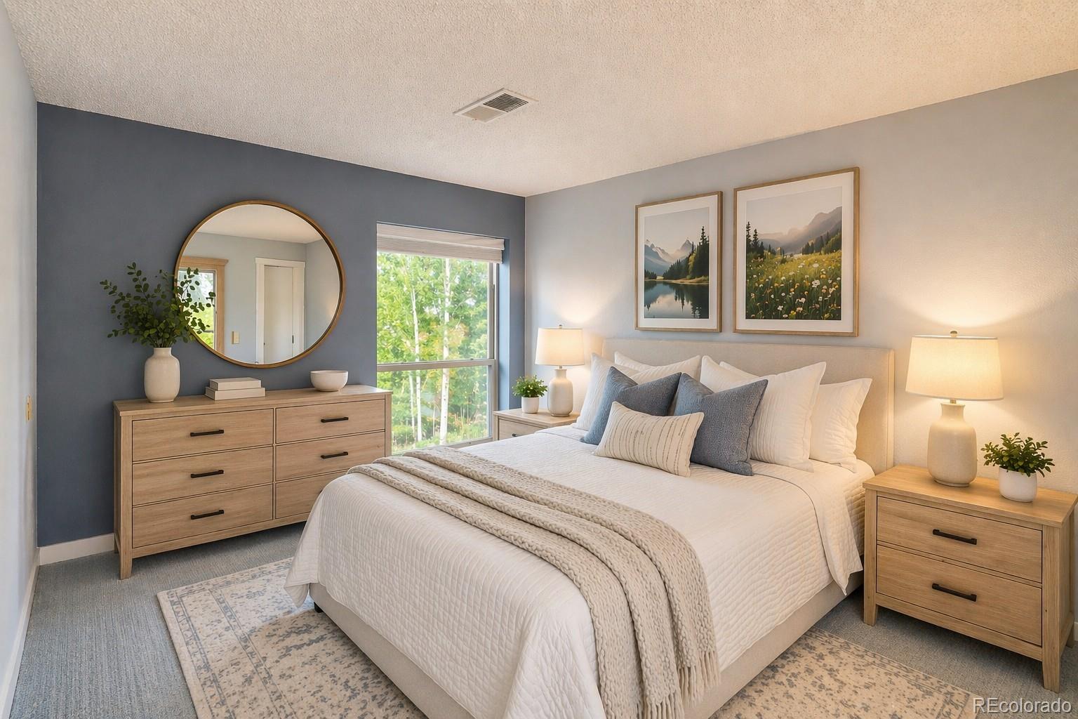 2510 Ryan Gulch Road, Unit 2512 Silverthorne, CO 80498 - Photo 20 of 41 a bedroom with a bed and a dresser