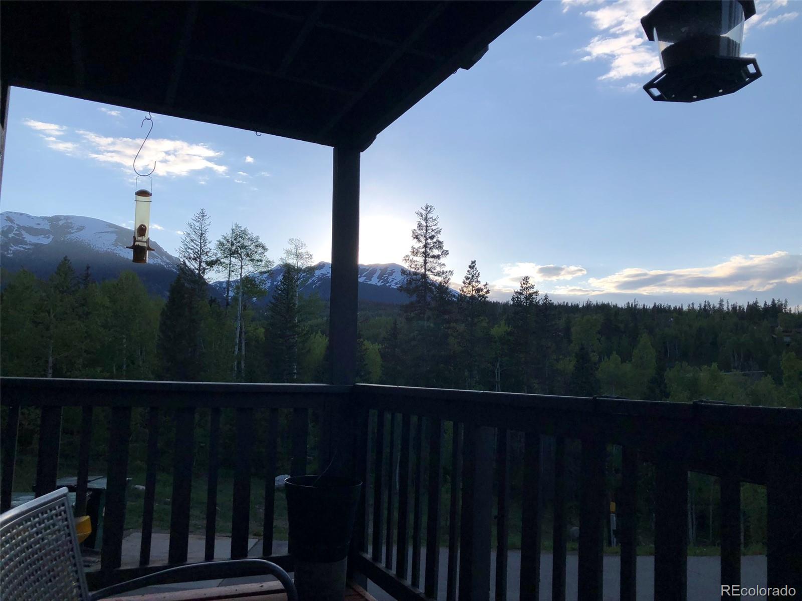2510 Ryan Gulch Road, Unit 2512 Silverthorne, CO 80498 - Photo 40 of 41 a view of a balcony with wooden floor and fence