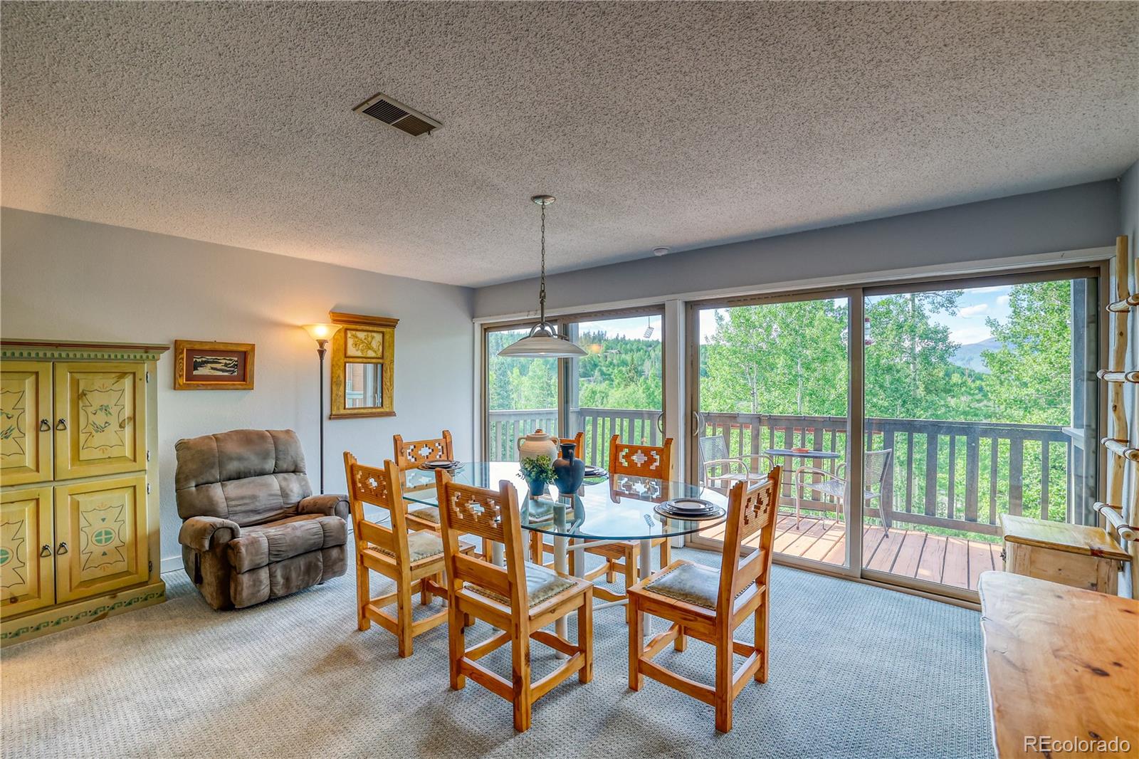 2510 Ryan Gulch Road, Unit 2512 Silverthorne, CO 80498 - Photo 4 of 41 a living room with furniture and a large window