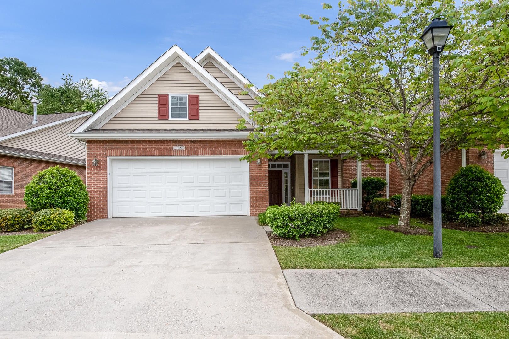 116 Devanshire Court Oak Ridge, TN 37830 - Photo 1 of 30 front view of a house with a yard and an trees