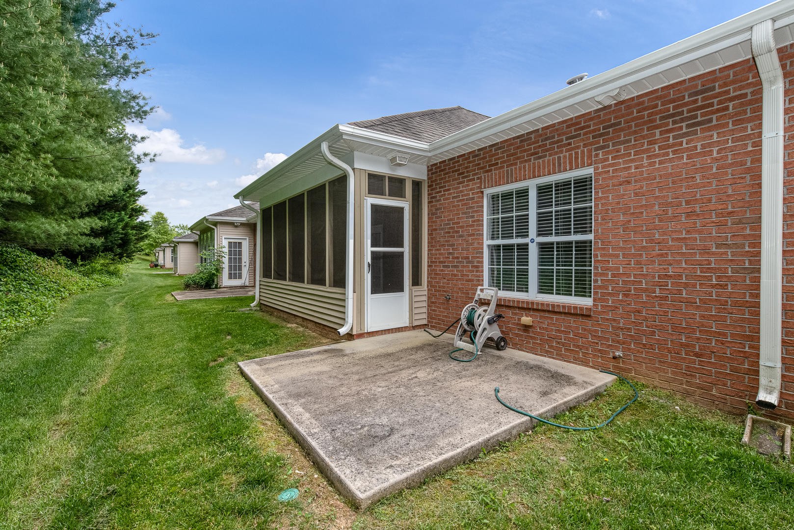 116 Devanshire Court Oak Ridge, TN 37830 - Photo 29 of 30 a front view of a house with garden