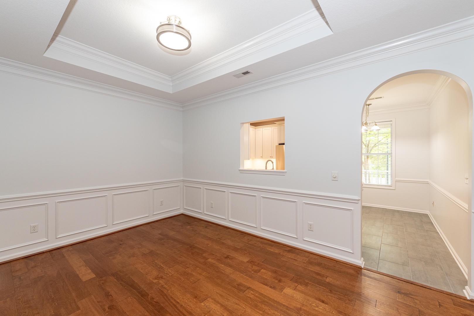 116 Devanshire Court Oak Ridge, TN 37830 - Photo 10 of 30 wooden floor in an empty room with a window
