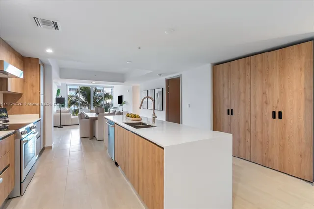 a bedroom with a bed and a cabinets