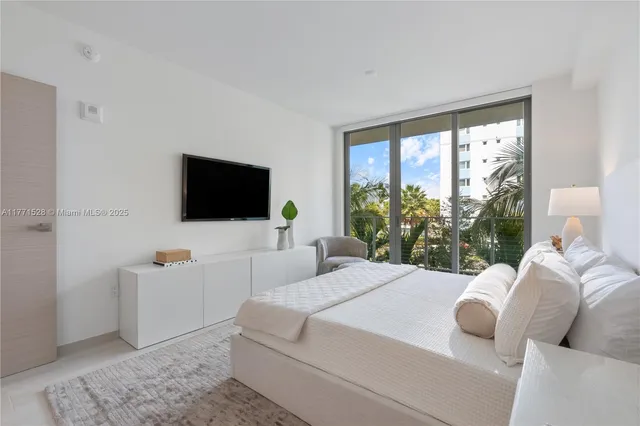 a view of a house with a backyard porch and sitting area