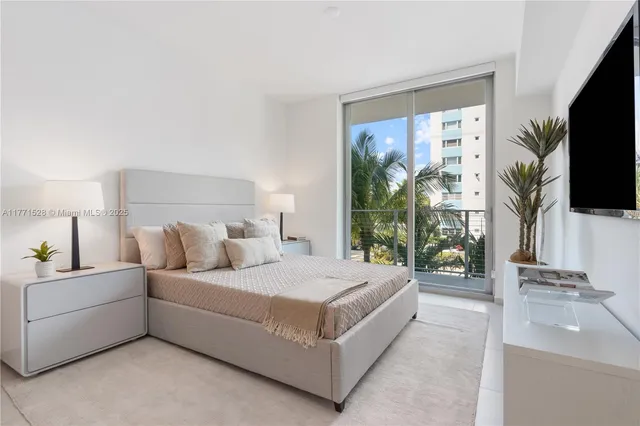 a view of a swimming pool with outdoor seating