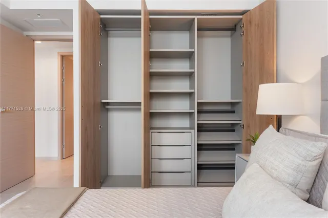 an aerial view of residential house with outdoor space and trees