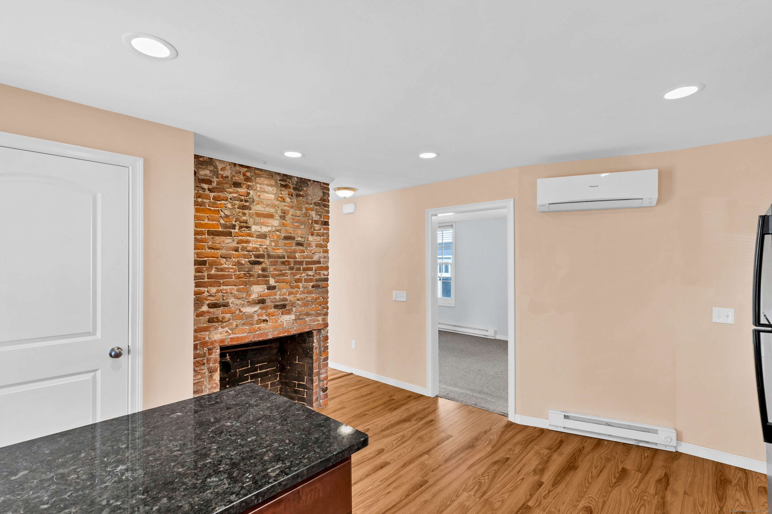 9 Brewer Street New London, CT 06320 - Photo 26 of 40 an entryway and livingroom with furniture