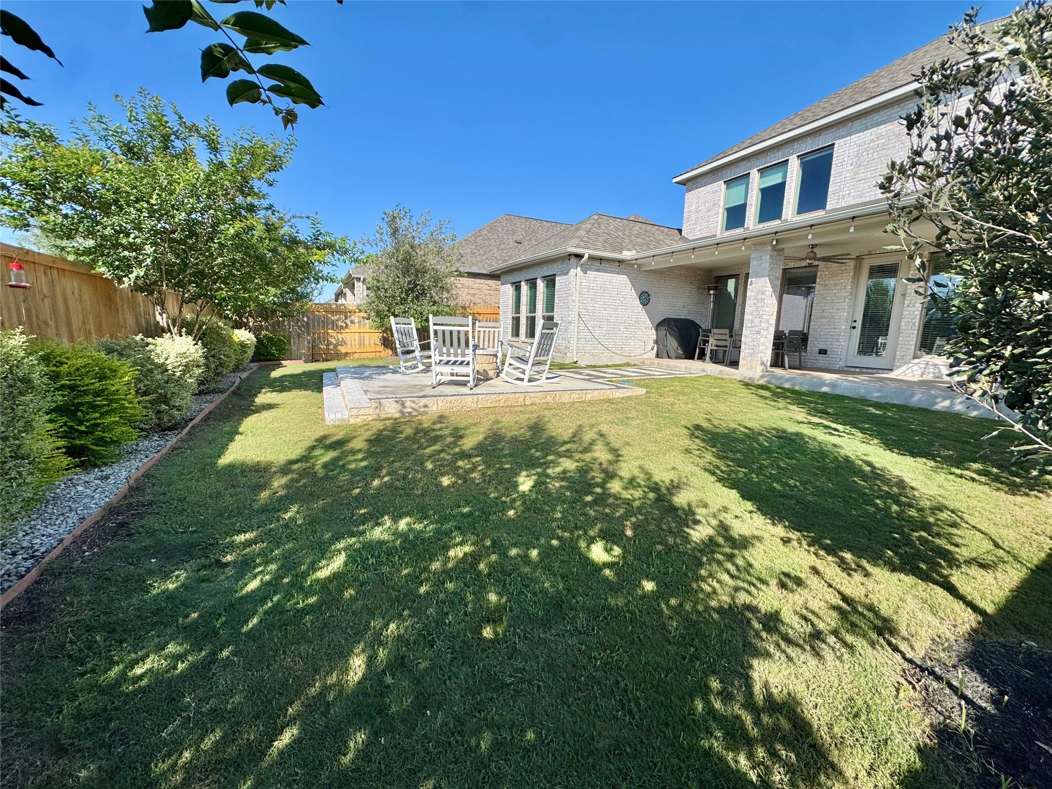 561 Cold Riv Run Kyle, TX 78640 - Photo 27 of 33 a front view of a house with garden