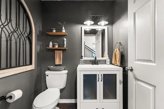 a view of a storage and utility room with washer and dryer