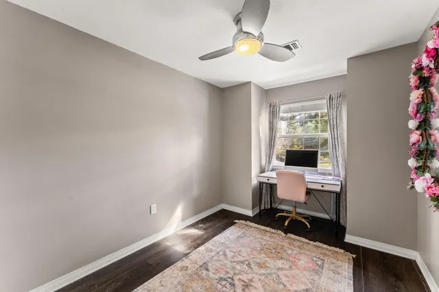 a view of a entryway with flowers