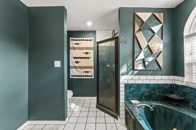 a view of a balcony with chairs