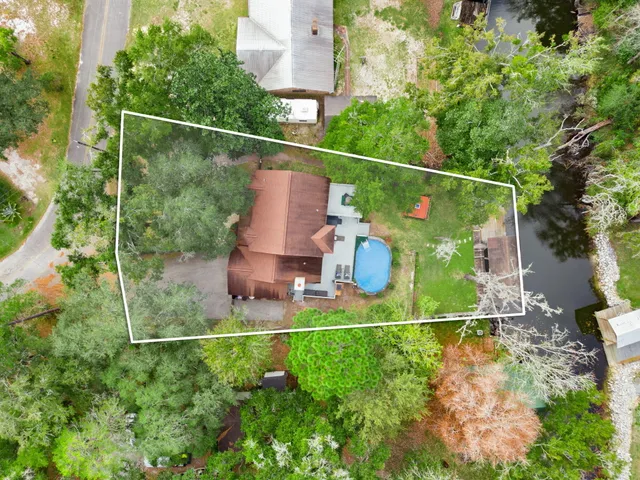 a view of a yard from a balcony