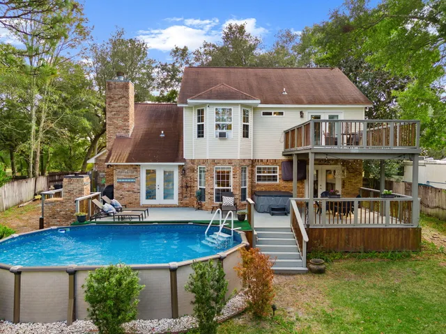 a view of a chairs and table in the patio