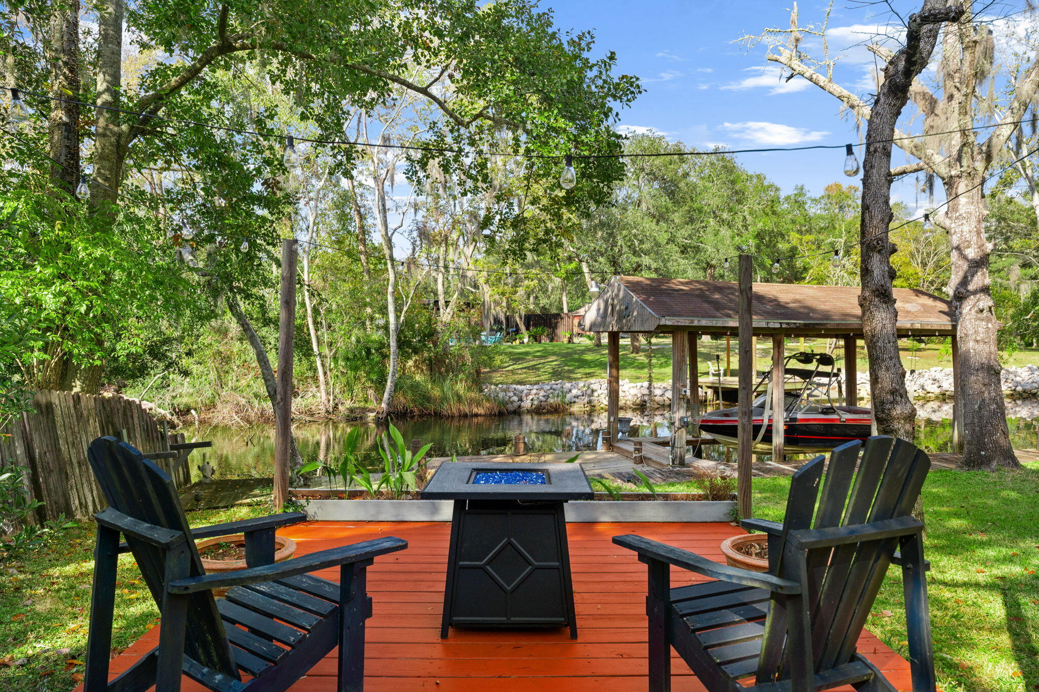 110 Rodney Drive Freeport, FL 32439 - Photo 46 of 58 Small Firepit Deck in Back Yard