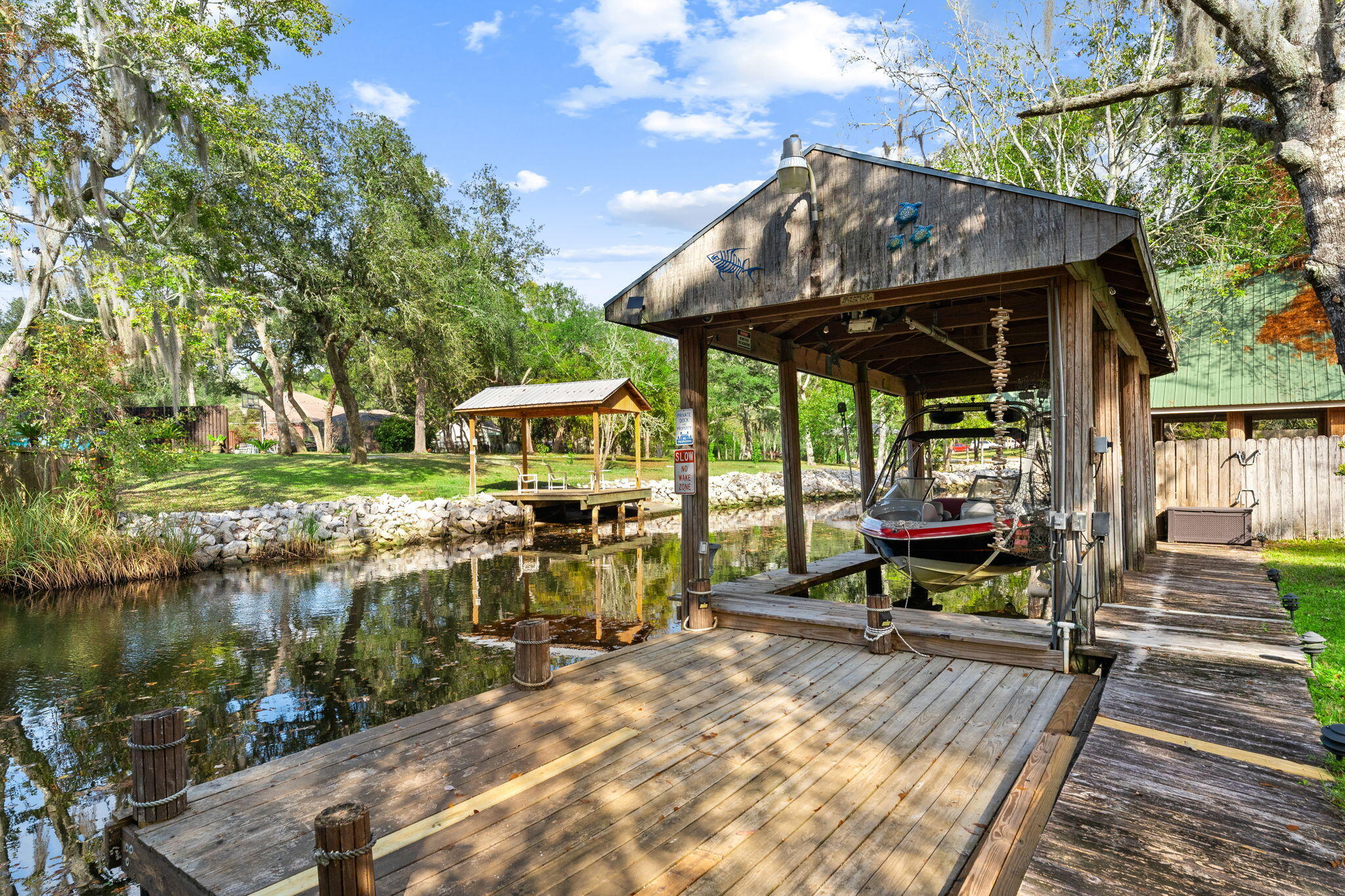 110 Rodney Drive Freeport, FL 32439 - Photo 48 of 58 Dock With Boat Lift