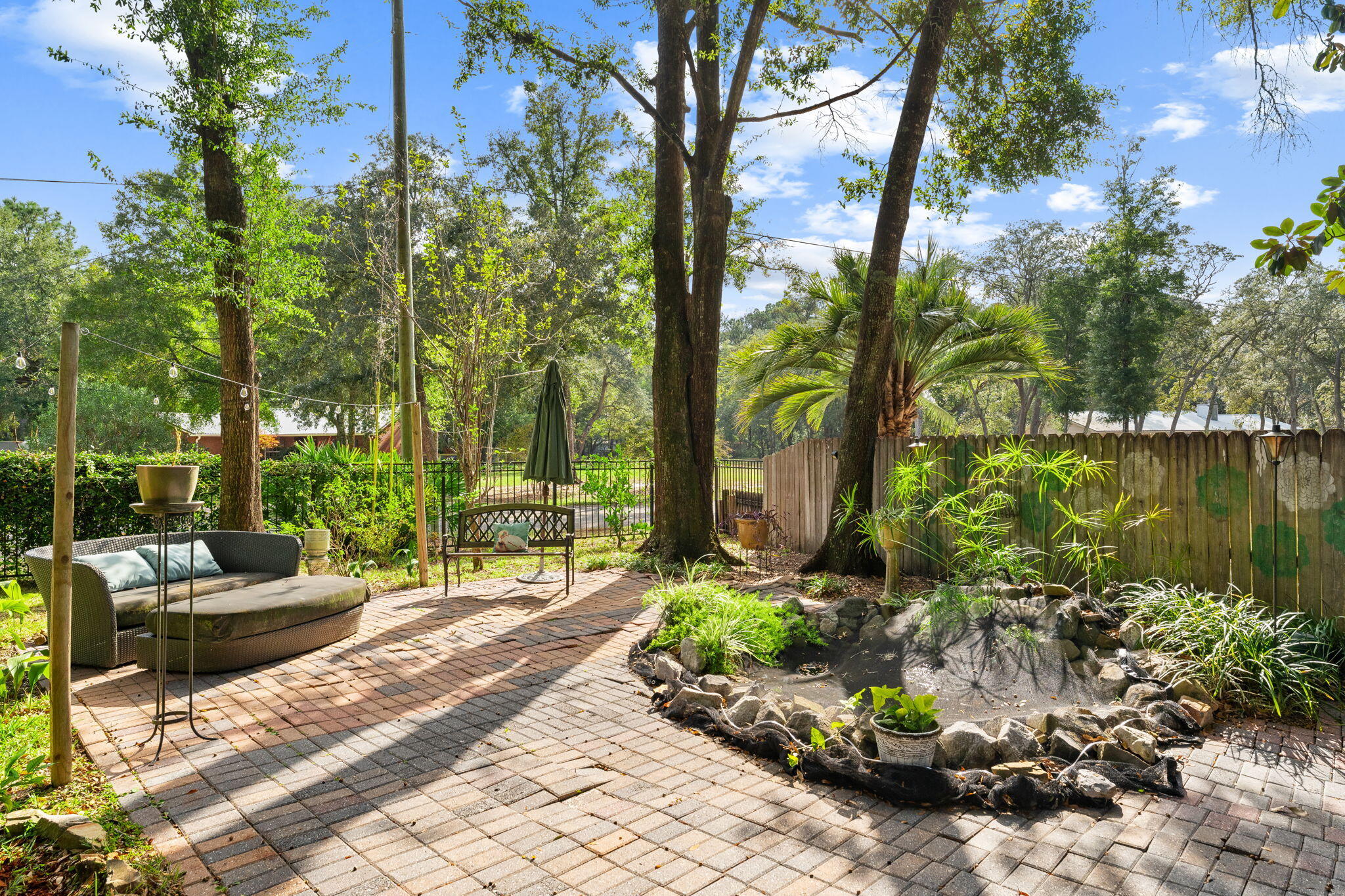 110 Rodney Drive Freeport, FL 32439 - Photo 6 of 58 Front Yard - Koi Pond
