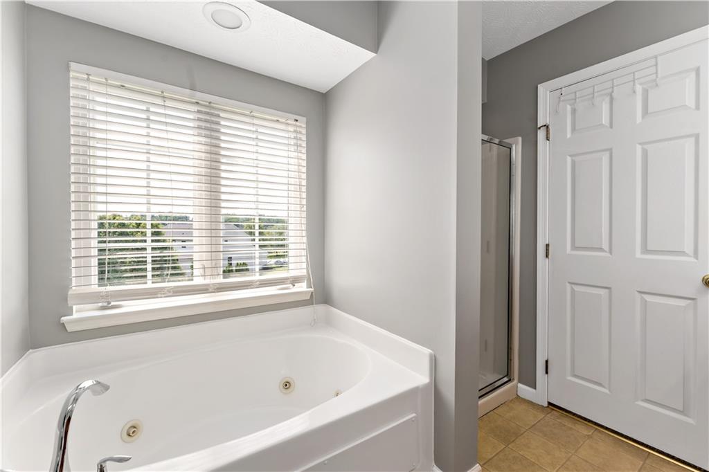 2000 Michael Drive Pittsburgh, PA 15227 - Photo 21 of 45 a white bath tub sitting next to a window