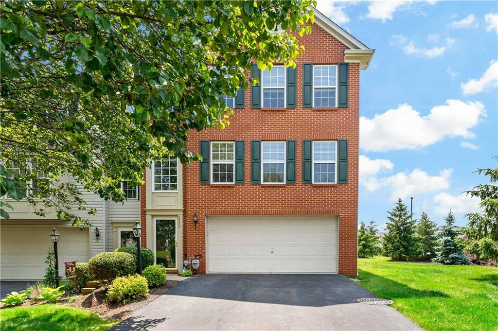 2000 Michael Drive Pittsburgh, PA 15227 - Photo 40 of 45 a front view of a house with a yard and garage