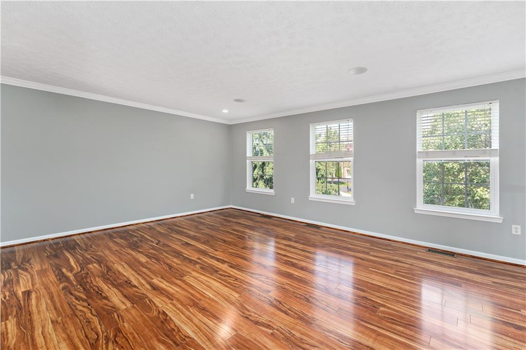 2000 Michael Drive Pittsburgh, PA 15227 - Photo 4 of 45 a view of an empty room with wooden floor and a window